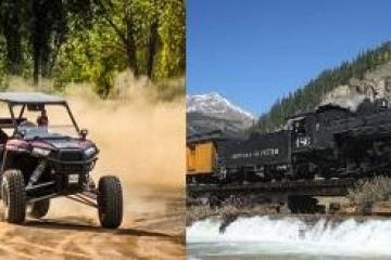 a truck driving down a dirt road