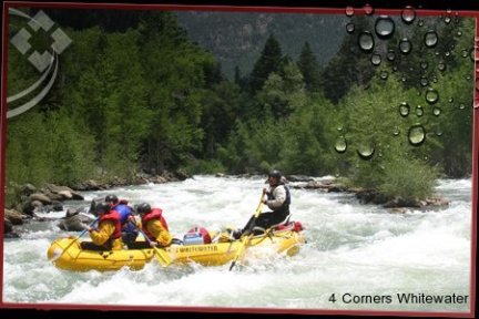 a group of people on a raft in a body of water